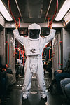 Astronaut travelling in train