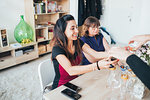 Businesswomen having coffee in loft office