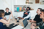 Businessmen and businesswomen having discussion in loft office