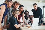 Businessmen and businesswomen having discussion in loft office