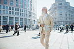 Senior businessman exploring city, Milano, Lombardia, Italy