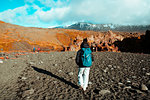 Tourists walking on black beach, Djúpalónssandur, Snaefellsjökull, Iceland