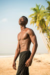 Muscular man on beach