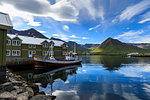 Fishing boat, hotel, mountain and fjord scenery, Siglufjordur, (Siglufjorour), stunning Summer weather, North Iceland, Europe, Europe