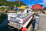 Church, busy cafes, fishing boat and mountains, Siglufjordur, (Siglufjorour), stunning Summer weather, North Iceland, Europe, Europe