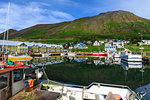 Harbour, hotel and fishing boats, mountains, reflections, Siglufjordur, (Siglufjorour), stunning Summer weather, North Iceland, Europe