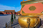 Golden cistern and security guards in the Forbidden City, Beijing, China