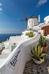 View of windmill overlooking Oia village, Santorini, Cyclades, Aegean Islands, Greek Islands, Greece, Europe