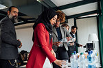 Business partners having tea break in office