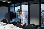 Businessman using smartphone in office