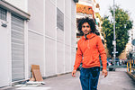 Young man exploring city, Milano, Lombardia, Italy