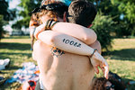 Couple hugging in park