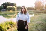 Young woman by lake