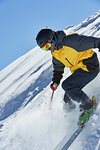 Skier moving down slopes, Saas-Fee, Valais, Switzerland