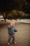 Baby walking on beach