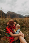 Mother and baby in wilderness by lake, Queenstown, Canterbury, New Zealand