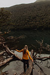 Woman enjoying scenic lake view, Queenstown, Canterbury, New Zealand