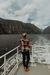 Woman on lake cruise, Queenstown, Canterbury, New Zealand