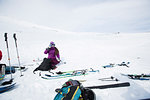 Woman resting from cross country skiing