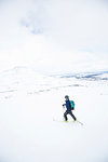 Man cross country skiing