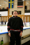 Girl in ice hockey uniform during training