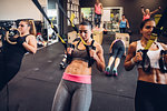 Women training in gym, resistance training