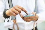 Man using smartphone outdoors