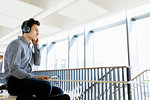 Businessman using digital tablet in office