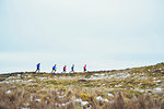 Friends jogging in snow