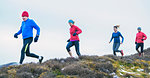 Friends jogging on trail