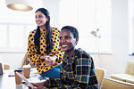 Happy, confident businesswomen in meeting