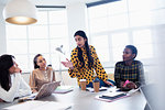 Businesswomen talking in conference room meeting