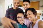 Happy family taking selfie