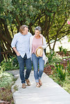 Couple enjoying walk on garden path, Cape Town, South Africa