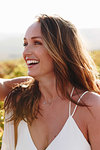 Woman laughing in sunshine