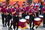 Drummers in uniforms in a marching band in the Our Lady of Loreto Procession in San Miguel de Allende, Guanajuato, Mexico