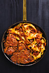 close up of rustic italian oxtail ragu pappardelle pasta