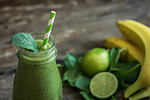 Fresh Green Smoothie on Rustic Wood
