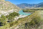 Confluence of Big Yaloman inflow into the river Katun. Low water. Altai Mountains, Russia. Sunny summer day.