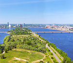 Summer aerial view of city Riga from the height of the TV tower. View of the old town, Zakusala island, bridges over the rivers Daugava and Western Dvina. Latvia, Baltic States, European Union