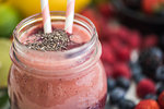 Detail of Fresh Smoothie with Fruit in Background