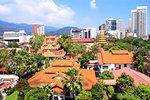 Aerial view on Pulau Tikus, thai Buddhist temple (Wat Chayamangkalaram) and Georgetown, Penang island, Malaysia