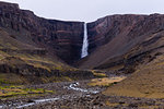 Valley landscape with distant waterfall and stream, Hofn, Austur-Skaftafellssysla, Iceland