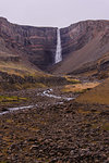 Valley landscape with rock formation waterfall, Hofn, Austur-Skaftafellssysla, Iceland