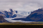 Snow capped mountain landscape with glacier and low cloud, Skaftafell, Austur-Skaftafellssysla, Iceland