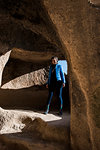 Woman exploring Selime Monastery, Göreme, Cappadocia, Nevsehir, Turkey