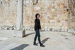 Woman exploring ancient city, Izmir, Turkey