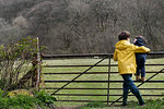 Brothers playing in countryside