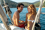 Affectionate couple on sailboat, Italy