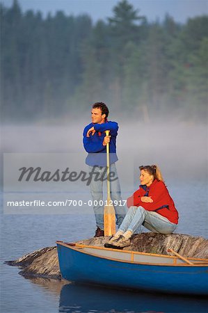 Couple with Canoe, Tom Thomson Lake, Algonquin Park, Ontario Canada